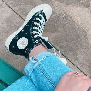 Black high top converse- golden elements with stars and moons.